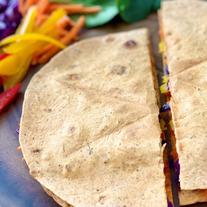 Looking for a  yummy but simple dinner for yourself or the whole family? This quesadilla is not only full of color but nutrients too!