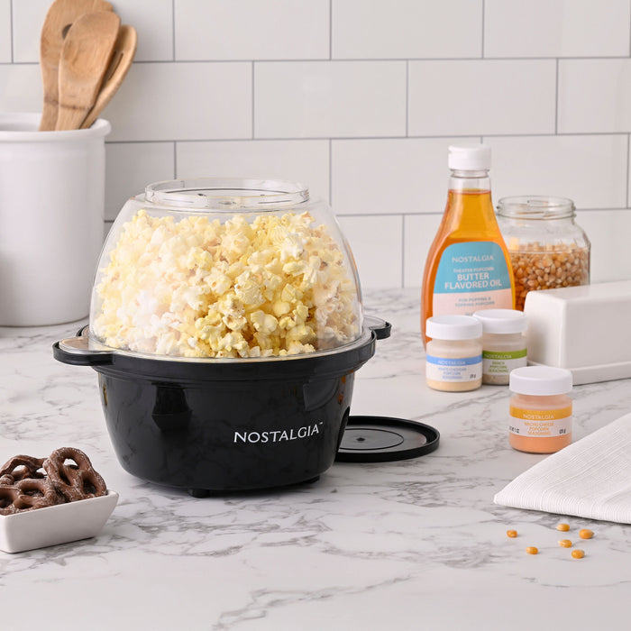 Macchina per popcorn elettrica retro con cesto da 1200W. Cottura con Macchina per popcorn elettrica retro con cesto da 1200W. Cottura con