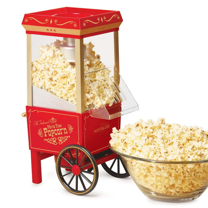 Nostalgia 12-Cup Hot Air Popcorn Maker, red with a bowl of popcorn